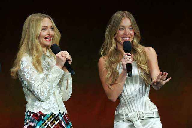 Actresses Amanda Seyfried (L) and Sydney Sweeney speak on stage during the Lionsgate presentation at The Colosseum at Caesars Palace at CinemaCon 2024 in Las Vegas, Nevada, on April 1, 2025. (Photo by Valerie Macon/AFP Photo)
