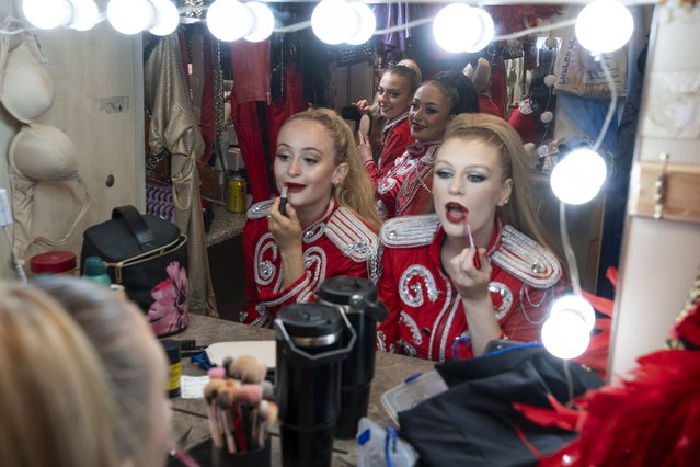 Behind the scenes at Rock it Out, a circus show fusing live music and death-defying stunts in West Thurrock, Essex on April 10, 2025. They will attempt a British first: a double somersault on a rotating wheel. (Photo by Jeff Moore)