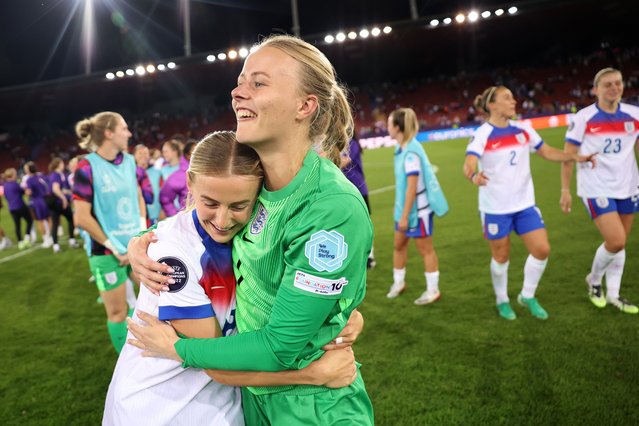 Hannah Hampton of England celebrates with team mate Chloe Kelly after the team's victory in the penalty shoot out and subsequent progression to the semi-final during the UEFA Women's EURO 2025 Quarter-Final match between Sweden and England at Stadion Letzigrund on July 17, 2025 in Zurich, Switzerland. (Photo by Maja Hitij – UEFA/UEFA via Getty Images)