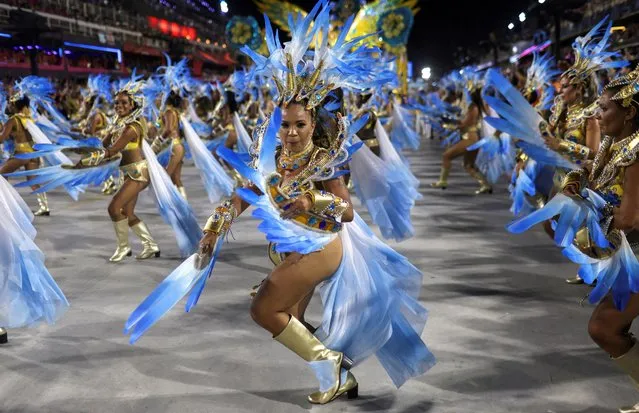 Revelers from Portela samba school perform during the second night of the carnival parade at the Sambadrome, in Rio de Janeiro, Brazil on February 20, 2023. (Photo by Ricardo Moraes/Reuters)