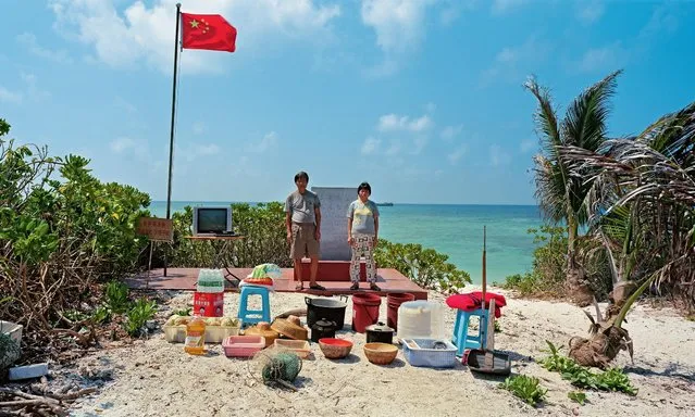 A couple who live on North Island, Seven Banks, Xisha Islands, Sansha city, Hainan province. (Photo by Ma Hongjie)