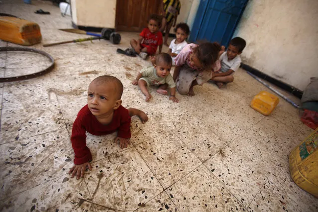 Children play at a school sheltering them in the southern Yemeni port city of Aden October 8, 2012. (Photo by Khaled Abdullah/Reuters)