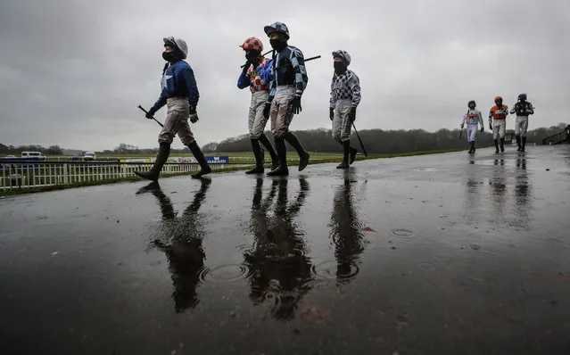 Jockeys make their way to the start before the Thanks To Alan Quinton Handicap Hurdle at Chepstow Racecourse on January 20, 2021 in Chepstow, Wales. (Photo by David Davies – Pool/Getty Images)