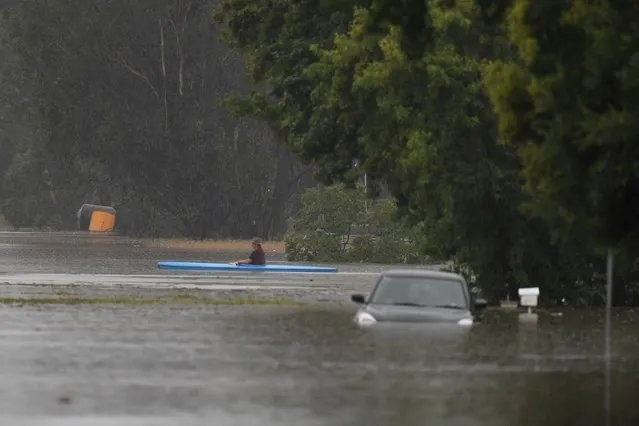 Flooded Old Hawkesbury Road near Pitt Town and Windsor in the North West of Sydney, Monday, March 22, 2021. Thousands of residents are fleeing their homes, schools are shut, and scores of people have been rescued as NSW is hit by once-in-a-generation flooding. (Photo by Dean Lewins/AAP Image)