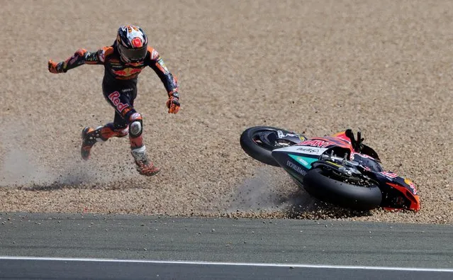 Red Bull KTM Ajo's Pedro Acosta falls during the Moto2 race French Grand Prix in Le Mans, France on May 15, 2022. (Photo by Pascal Rossignol/Reuters)