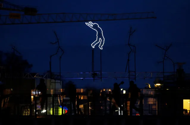 The light installation “Run Beyond” by Angelo Bonello is pictured ahead of the opening of the Lausanne Lumieres light festival in Lausanne, Switzerland November 23, 2016. (Photo by Denis Balibouse/Reuters)