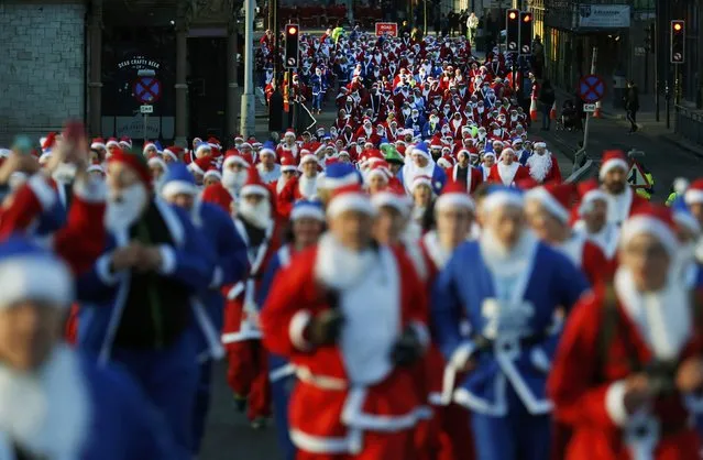 Competitors dressed as Santa Claus compete in the annual 5KM Santa Dash in Liverpool, northern England December 4, 2016. (Photo by Phil Noble/Reuters)