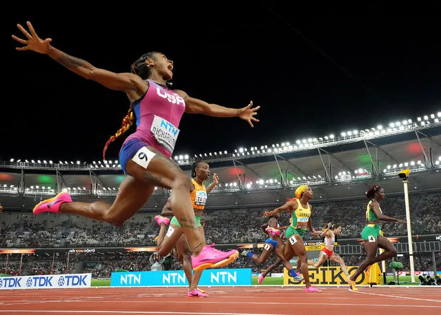 USA's Sha'Carri Richardson reacts after crossing the finish line to win the women's 100m final during the World Athletics Championships at the National Athletics Centre in Budapest on August 21, 2023. (Photo by Pawel Kopczynski/Reuters)