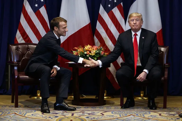 President Donald Trump meets with French President Emmanuel Macron at the Lotte New York Palace hotel during the United Nations General Assembly, Monday, September 24, 2018, in New York. (Photo by Evan Vucci/AP Photo)