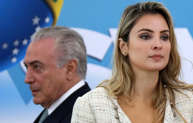 Brazil's President Michel Temer and his wife Marcela attend a ceremony at Planalto Palace in Brasilia, Brazil December 7, 2016. (Photo by Adriano Machado/Reuters)