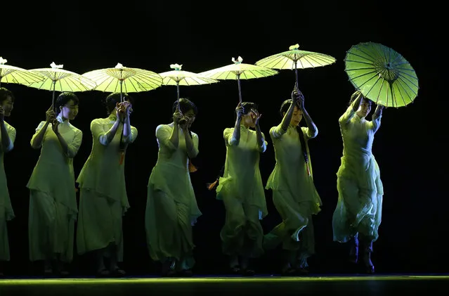 Chinese dancers perform during a rehearsal of “Chinese Dance: Maestros & Classics”, the closing performance of the NCPA Dance Festival 2016 at the National Centre for the Perfoming Arts (NCPA) Theatre in Beijing, China, 11 December 2016. The closing performance will showcase award winning works of Chinese dance, ballet, modern dance, contemporary dance, dance opera and poetry in the country created during the years 2015 to 2016. (Photo by How Hwee Young/EPA)