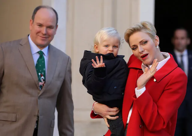 Prince Albert II of Monaco (L), his wife Princess Charlene (R) and their son Prince Jacques attend the traditional Christmas tree ceremony at the Monaco Palace as part of Christmas holiday season in Monaco December 14, 2016. (Photo by Eric Gaillard/Reuters)
