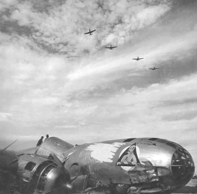 “Uncle Sam's Milk Run”. B-29A-10-BN Superfortress, s/n 42-93906, 24th BS, 6th BG, 20th AF. Aircraft was originally named “Ernie Pyle's Milk Run” in reference to the reporters statement that bombing missions in the Pacific were “milk runs” compared to missions in Europe. After Pyle's death on April 17,1945 the crew decided to change the name and painted over the original. Shown is the aftermath of the crash-landing at Iwo Jima on May 23, 1945 after a mission to Tokyo by the LT Parks crew (2401). The crash killed the CoPilot and wounded the pilot and one gunner. (Photo from D. Sheley collection)