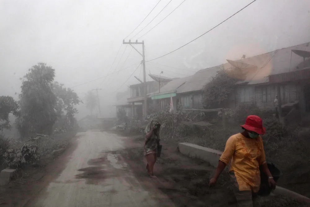 Indonesian Volcano Continues to Disrupt Life with Eruption