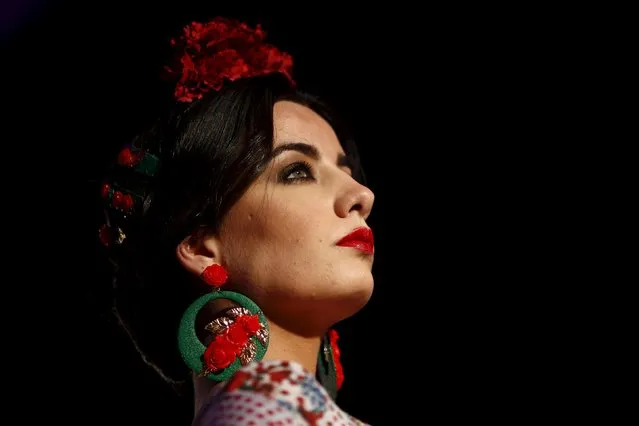 A model presents a creation by Flamenca Gomez during the International Flamenco Fashion Fair (FIMAF) in Malaga, February 27, 2016. (Photo by Jon Nazca/Reuters)