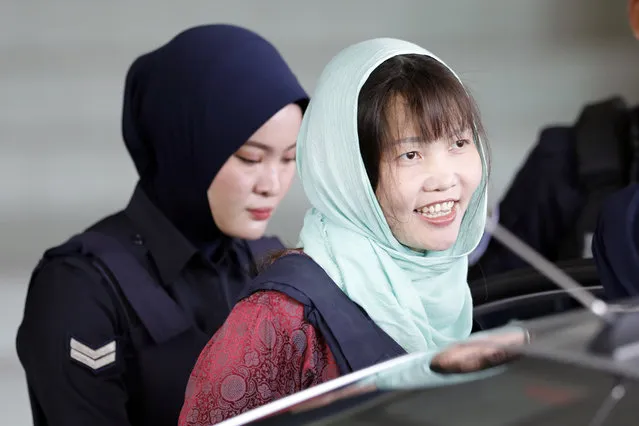 Vietnamese Doan Thi Huong, right, leaves Shah Alam High Court in Shah Alam, Malaysia, Monday, April 1, 2019. The Vietnamese woman who is the only suspect in custody for the killing of the North Korean leader's brother Kim Jong Nam pleaded guilty to a lesser charge in a Malaysian court on Monday and her lawyer said she could be freed as early as next month. (Photo by Vincent Thian/AP Photo)