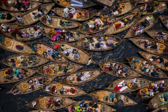 Shortlisted: Polluted Buriganga River, Dhaka, Bangladesh, 2021. A busy polluted waterway on Buriganga River is filled with boats and their passengers on the morning work commute to the densely populated city of Dhaka, home to an estimated 21 million people. (Photo by Azim Khan Ronnie/CIWEM Environmental Photographer of the Year 2021)