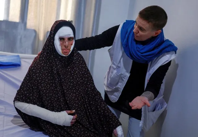 Palestinian Shaima Qarmout, who suffers from burns caused by an Israeli strike, receives treatment provided by Doctors Without Borders, at a hospital in Rafah in the southern Gaza Strip, on March 20, 2024. (Photo by Mohammed Salem/Reuters)