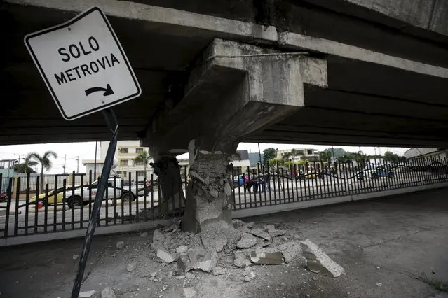 A collapsed bridge is seen after an earthquake struck off the Pacific coast, in Guayaquil, Ecuador, April 17, 2016. (Photo by Henry Romero/Reuters)