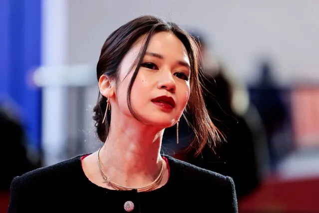 Cast member Laura Basuki arrives at the red carpet to promote the movie “Nana (Before, Now & Then)” at the 72nd Berlinale International Film Festival in Berlin, Germany, February 12, 2022. (Photo by Hannibal Hanschke/Reuters)