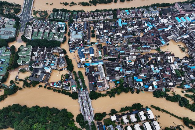 This aerial photo shows flooded areas after storms in Guilin, in southwestern China's Guangxi province on June 20, 2024. (Photo by AFP Photo/China Stringer Network)