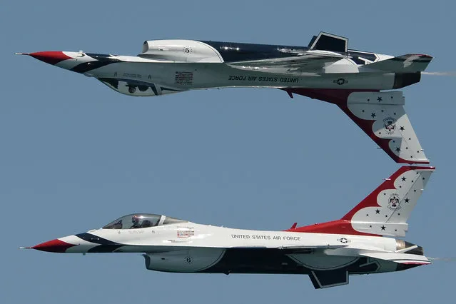 The U.S. Air Force Thunderbirds fly their F-16s in formation at the Fort Lauderdale Air Show on May 7, 2016 in Fort Lauderdale, Florida. (Photo by Brock Miller/Splash News and Pictures)