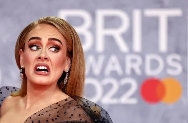 English singer-songwriter Adele poses as she arrives for the Brit Awards at the O2 Arena in London, Britain, February 8, 2022. (Photo by Tom Nicholson/Reuters)