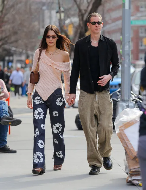 American model Bella Hadid and designer Marc Kalman spotted hand-in-hand after having lunch at Bar Pitti in NYC on March 15, 2022, then Marc make a quick stop at a small shop to buy cigarettes in the west village. (Photo by Felipe Ramales/Splash News and Pictures)