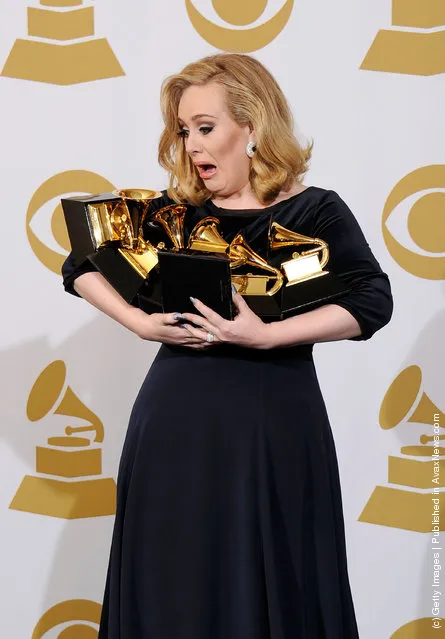 Singer Adele, winner of the GRAMMYs for Record of the Year for 'Rolling In The Deep', Album of the Year for '21', Song of the Year for 'Rolling In The Deep', Best Pop Solo Performance for 'Someone Like You', Best Pop Vocal Album for '21' and Best Short Form Music Video for 'Rolling In The Deep', poses in the press room at the 54th Annual GRAMMY Awards