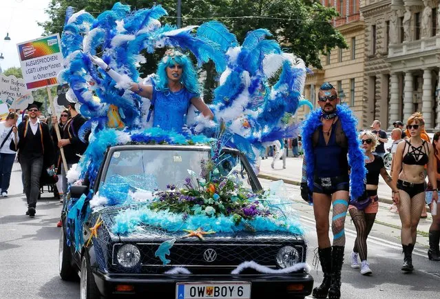 Revellers participate in the Regenbogenparade gay pride parade in Vienna, Austria, June 18, 2016. (Photo by Heinz-Peter Bader/Reuters)