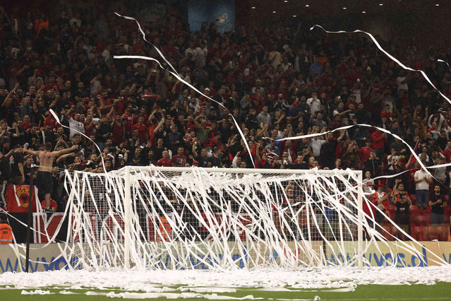 The goal post is covered with papers thrown by Albanian fans prior the start of the UEFA Nations League soccer match between Albania and Israel at Air Albania stadium in Tirana, Albanian, on Friday, June 10, 2022. (Photo by Franc Zhurda/AP Photo)
