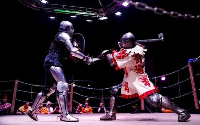 Participants dressed in historical armours fight during the WMFC Medieval fighting championship in Moscow, Russia on February 23, 2020. (Photo by Maxim Shemetov/Reuters)