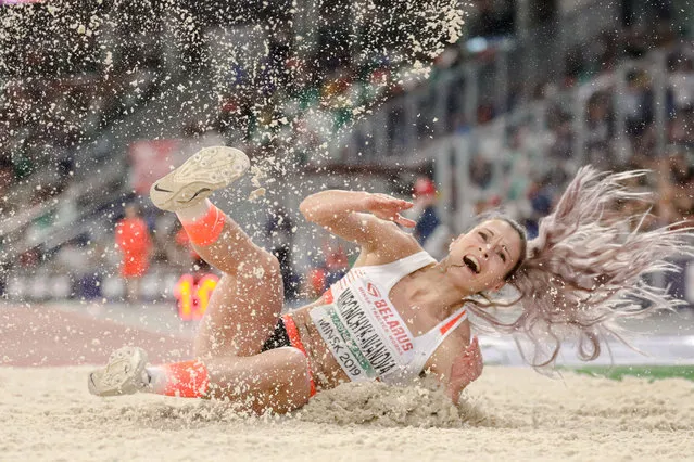 Belarusian long jumper Nastassia Mironchyk-Ivanova lands at the The Match Europe v USA, an international two-day competition between the United States and Europe in Minsk on September 10, 2019. (Photo by Uladz Hrydzin/Radio Free Europe/Radio Liberty)