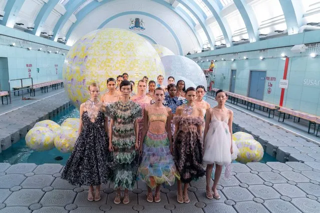 Models poses for a photograph during a rehearsal prior to a show by fashion designer Susan Fang, for their Spring/Summer 2023 catwalk on the fifth day of London Fashion Week June Edition, in London, on September 20, 2022. (Photo by Niklas Halle'n/AFP Photo)