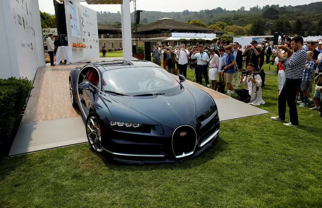 A Bugatti Chiron is driven off the main stage during The Quail, A Motorsports Gathering, in Carmel, California, U.S. August 19, 2016. (Photo by Michael Fiala/Reuters/Courtesy of The Revs Institute)