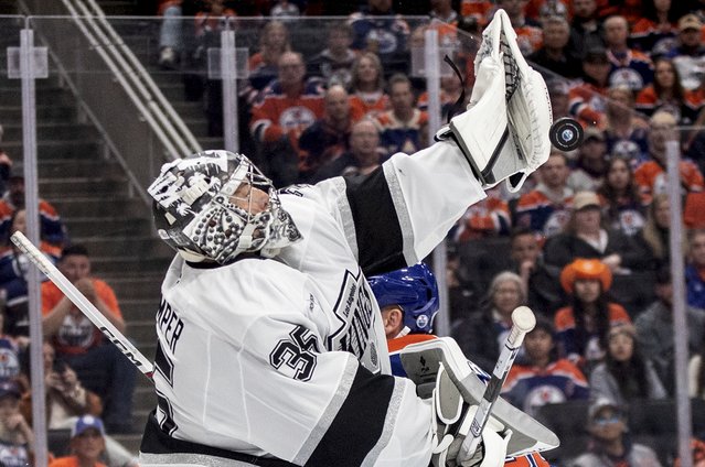 Los Angeles Kings' goalie Darcy Kuemper Photo: 35) makes a save against the Edmonton Oilers during the second period of an NHL playoff game in Edmonton on Sunday, April 27, 2025. (Photo by Jason Franson/The Canadian Press via AP Photo)