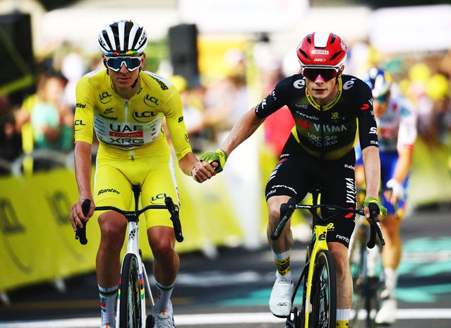 UAE Team Emirates XRG's Tadej Pogacar crosses the finish line in ninth place in Stage 10 with tenth placed Team Visma | Lease a Bike's Jonas Vingegaard during the Tour de France on July 14, 2025. (Photo by Sarah Meyssonnier/Reuters)