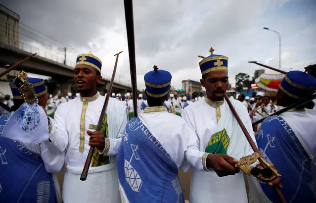 A church choir performs during the Meskel Festival to commemorate the discovery of the true cross on which Jesus Christ was crucified on, at the Meskel Square in Ethiopia's capital Addis Ababa, September 26, 2016. (Photo by Tiksa Negeri/Reuters)