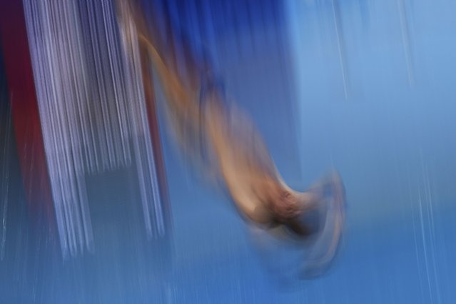 Sam Vajerhelabad of Iran competes in the men's 3m springboard diving preliminaries at the World Aquatics Championships in Singapore, Thursday, July 31, 2025. (Photo by Ng Han Guan/AP Photo)