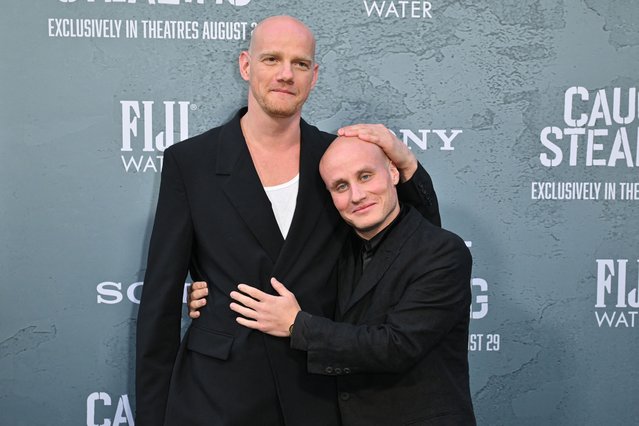 Russian actors Nikita Kukushkin (R) and Yuri Kolokolnikov attend the premiere of “Caught Stealing” at the Regal Union Square in New York on August 26, 2025. (Photo by Angela Weiss/AFP Photo)