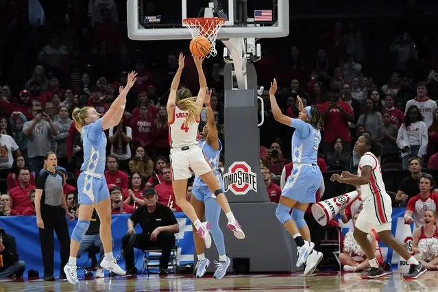 Ohio State guard Jacy Sheldon (4) hits the game winning shot against North Carolina in the second half of a second-round women's college basketball game in the NCAA Tournament Monday, March 20, 2023, in Columbus, Ohio. Ohio State won 71-69. (Phoot by Paul Sancya/AP Photo)