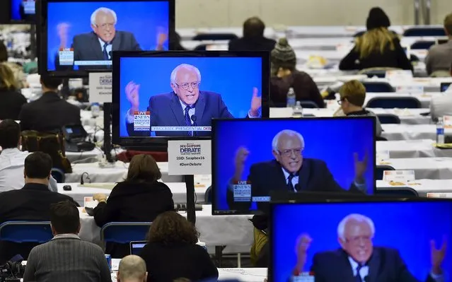 U.S. Democratic presidential candidate Bernie Sanders appears on television screens in the media work-room during the Democratic presidential candidates debate at Saint Anselm College in Manchester, New Hampshire December 19, 2015. (Photo by Gretchen Ertl/Reuters)