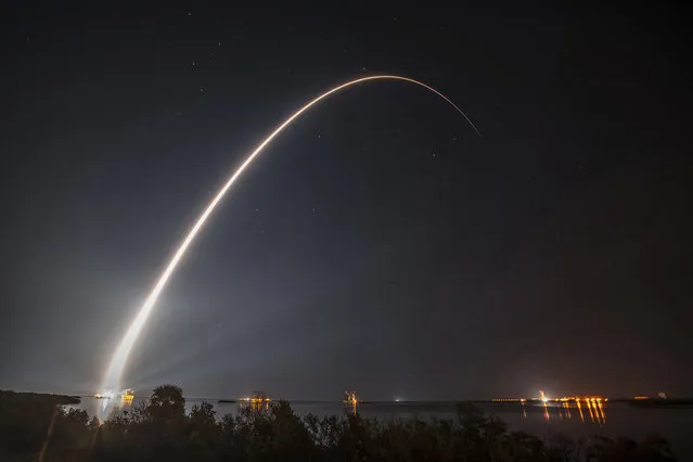 This photo provided by United Launch Alliance shows a United Launch Alliance (ULA) Atlas V rocket carrying GOES-R spacecraft for NASA and NOAA lifting off from Space Launch Complex-41 at 6:42 p.m. EST at Cape Canaveral Air Force Station, Fla., Saturday, November 19, 2016. The most advanced weather satellite ever built rocketed into space Saturday night, part of an $11 billion effort to revolutionize forecasting and save lives. (Photo by United Launch Alliance via AP Photo)
