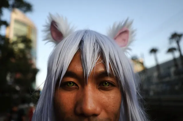 A cosplayer dressed as the character Inuyasha poses outside San Diego Comic-Con on July 19, 2018 in San Diego, California. Thousands of revelers are arriving for the festivities at the annual comic and entertainment convention. (Photo by Mario Tama/Getty Images)