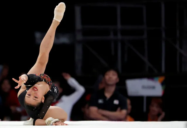 Japan' s Shiho Nakaji participates in the floor exercise competition in the final at the artistic gymnastics event during the 2018 Asian Games in Jakarta on August 24, 2018. (Photo by Cathal Mcnaughton/Reuters)