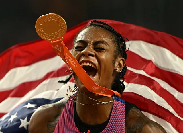 Sha'Carri Richardson of Team United States celebrates with her medal winning the Women's 100m Final during day three of the World Athletics Championships Budapest 2023 at National Athletics Centre on August 21, 2023 in Budapest, Hungary. (Photo by Dylan Martinez/Reuters)