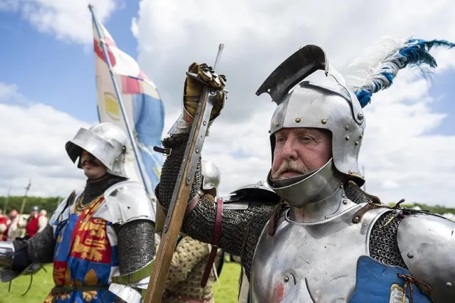 Re-enactors take part in Barnet Medieval Festival, in north London on June 12, 2022. It is the capital’s only medieval festival and dedicated to engaging people in the history of the Battle of Barnet and its significance within the Wars of the Roses. (Photo by Stephen Chung/London News Pictures)
