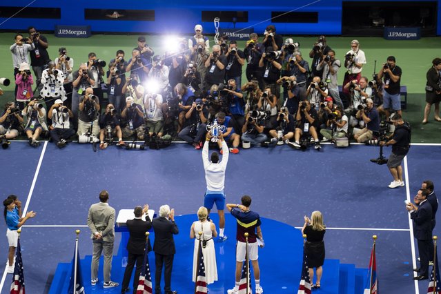 Novak Djokovic of Serbia lifts the championship trophy after he won against Daniil Medvedev of Russia in their Men's Final match at the US Open Tennis Championships at the Flushing Meadows, New York, USA, 10 September 2023. The US Open runs from 28 August through 10 September. (Photo by Will Oliver/EPA)