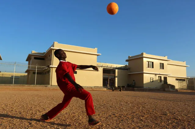 A former member of the militant group al-Shabaab prepares to play soccer inside the prison in Garowe, Puntland state in northeastern Somalia, December 14, 2016. (Photo by Feisal Omar/Reuters)