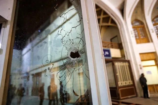 A bullet hole is seen after an attack at the Shah Cheragh Shrine in Shiraz, Iran on August 13, 2023. (Photo by Mohammadreza Dehdari/ISNA/WANA (West Asia News Agency) via Reuters)
